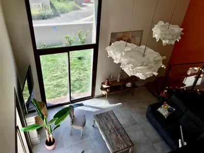 an overhead view of a living room with a couch at Escapade au Somail in Le Somail