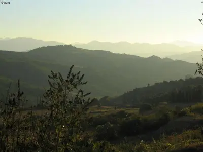 a view of a valley with mountains in the distance at Le Petit Coeur de Cassaignes in Cassaignes