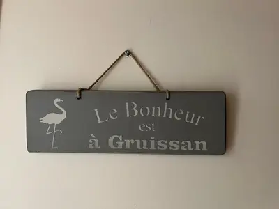 a sign that says le bonnets exit a grustsein at Maison Gruissan village in Gruissan
