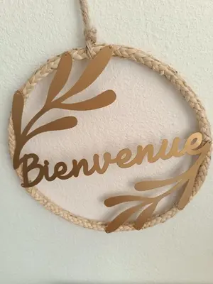 a wreath with the word bernanke written on it at Cocon lumineux avec cour privée in Salses-le-Chateau