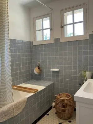 a bathroom with a shower and a tub and a sink at Le Doul Jolie villa au calme climatisée grande piscine jardin in Peyriac-de-Mer