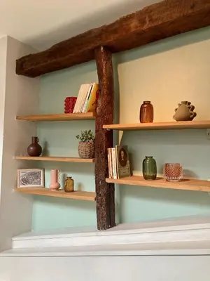 a room with wooden shelves with books at L'Escale médiévale in Carcassonne