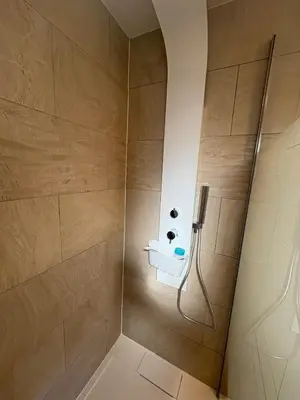 a bathroom with a shower with a sink at Gîte de Mia in Ventenac en Minervois