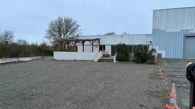 a parking lot in front of a building at Local, Training room, seminars, meetings, courses, formation in Castelnaudary