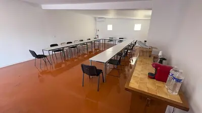 a large room with tables and chairs in it at Local, Training room, seminars, meetings, courses, formation in Castelnaudary