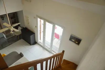an overhead view of a living room with a large window at Le Lagon Clim Parking 4Pers in Port-la-Nouvelle