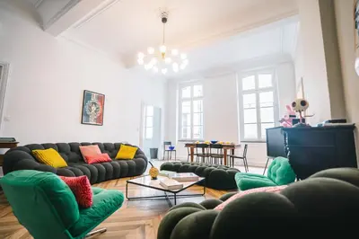 a large living room with couches and a television at Luxueux-Climatisation-3 chambres-2SDB-Garage -AJ in Carcassonne