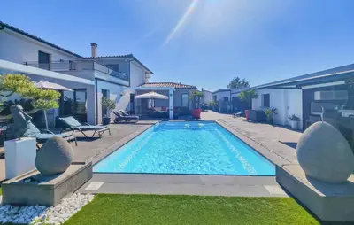 a swimming pool in the backyard of a house at Cozy Home In La Redorte in La Redorte