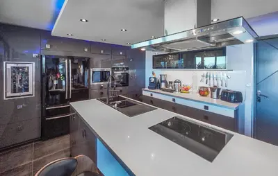 a kitchen with a white counter top in a room at Cozy Home In La Redorte in La Redorte