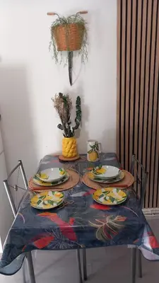 a table with plates of food on top of it at Studio Robine les halles avec clim in Narbonne