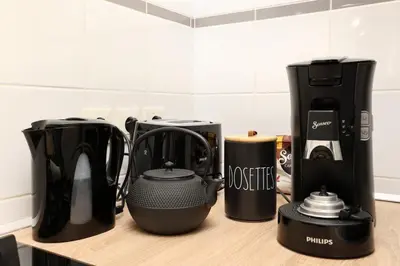 a group of appliances sitting on top of a counter at L'instant Voltaire in Carcassonne