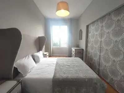 a bedroom with a large bed and a window at La Redorte Appartement au château 8 in La Redorte