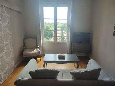 a living room with a couch and a table at La Redorte Appartement au château 8 in La Redorte