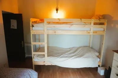 a couple of bunk beds in a room at Volet verts 8 personnes in Fitou