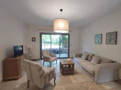 a living room with a couch and a table at La Redorte 23 in La Redorte