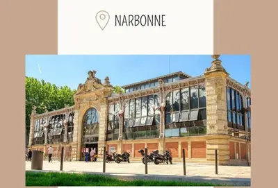 a large building with motorcycles parked outside of it at Albizia in La Redorte