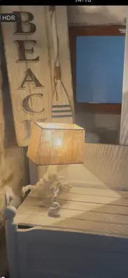 a lamp sitting on top of a desk at Ô banc de la vigne in Fabrezan