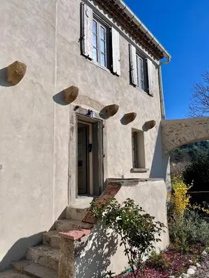 a stone house with a door and a staircase at La Maison de l'Aqueduc - 4 pers au cœur des vignes - in Cournanel