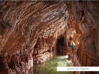 a person standing in a cave with water in it at Bienvenue chez Sandrine in La Redorte