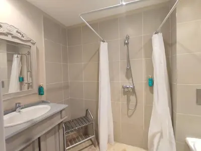 a bathroom with a shower and a sink at La Redorte 14 in La Redorte