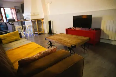 a small bed in a room with a window at Le Mirador St Just 3 people City in Narbonne