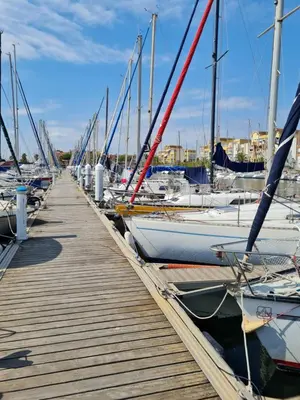 a bunch of boats docked at a dock at Quatre Vent in Gruissan