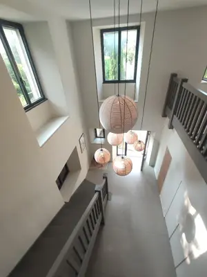 an overhead view of a staircase in a house at Séjour d'exception au Moulin de la Vernède avec piscine, ruisseau, climatisation et parking in Conques-sur-Orbiel