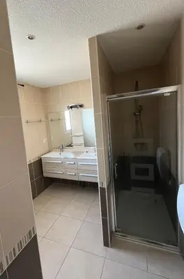 a bathroom with a shower and a sink at Villa Vinassan in Vinassan