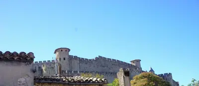 a castle on top of a hill with buildings at One Hundred in Carcassonne