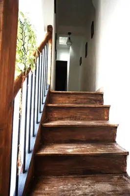a stairway with wooden steps in a house at One Hundred in Carcassonne