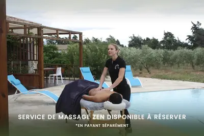 a woman getting a massage from a man in a pool at Domaine Des Lucques B&B with Private Infinity Pool & Grand Olive Grove in Bize-Minervois
