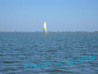 a sailboat in the middle of a large body of water at Chez Odile in Sigean