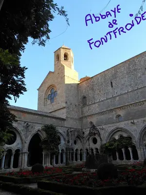 a church with a clock tower on top of it at Chez Odile in Sigean