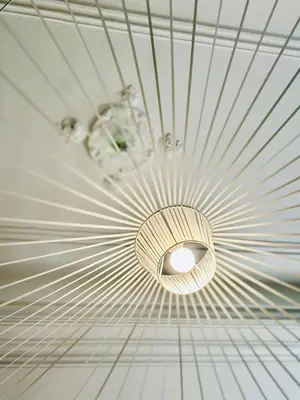a ceiling with a light fixture in a room at Puddington Abbey by Art&Suites Élégant XVIIIe 80m privatif Centre ville Calme et douceur de vivre in Narbonne