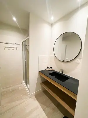 a bathroom with a sink and a mirror at Pipa in Narbonne