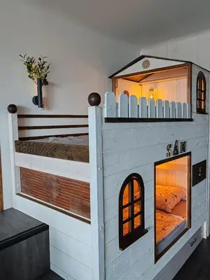 a play house with a bed inside of it at Studio SAM - Face à la Mer in Port-la-Nouvelle