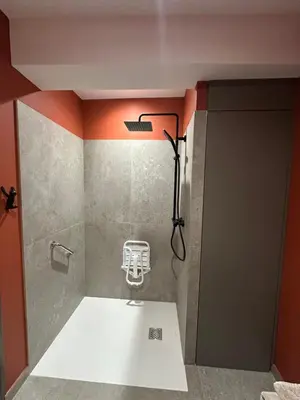 a bathroom with a shower with a sink at La remise d'Edouard in Saint-Papoul
