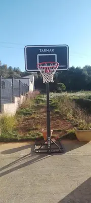 a basketball hoop with a net on a court at Maison dans le sud au calme avec extérieur in Ferrals-lès-Corbières