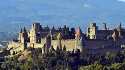 a large castle sitting on top of a hill at Maison dans le sud au calme avec extérieur in Ferrals-lès-Corbières