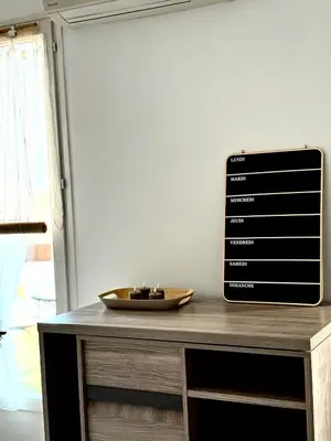 a table with a bowl on top of it at Appartement T2 in Port-la-Nouvelle