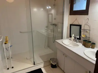 a bathroom with a shower and a sink at Beautiful large country house 4 bedrooms in Teyssode