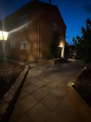 a house at night with a street light in front at Appartement indépendant climatisé Chez Amel & Rémi in Fabrezan