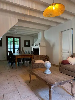 a living room with a couch and a table at chateau Laprade Narbonne in Narbonne