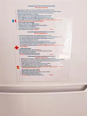 a white refrigerator with a label on it at L'espadon du port, air conditioning, terrace, sea, 5 people in Port-la-Nouvelle