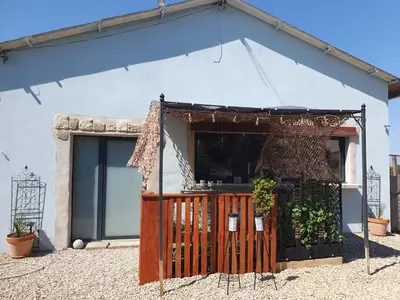 a house with a gate in front of it at Insinuances in Douzens