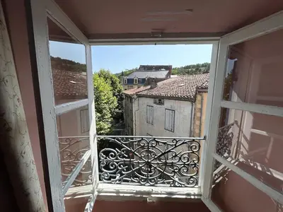 an open window with a view of a city at Tout Le Monde in Quillan