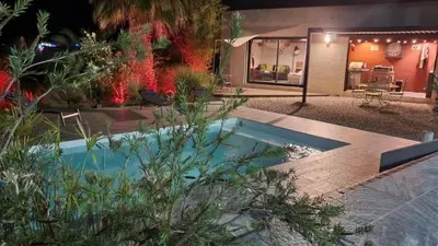 a house with a swimming pool in a yard at Havre de paix avec piscine et jacuzzi Narbonne in Ventenac en Minervois