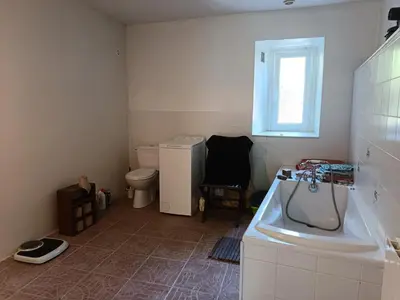 a small bathroom with a sink and a toilet at Chambre et b&b in Miraval-Cabardès