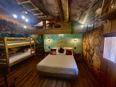 a bedroom with two bunk beds in a room at Studio repaire des pirates du Cloitre in Narbonne