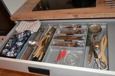a drawer filled with utensils in a kitchen at Villa MAGRI 3 bedrooms in Cuxac-dʼAude